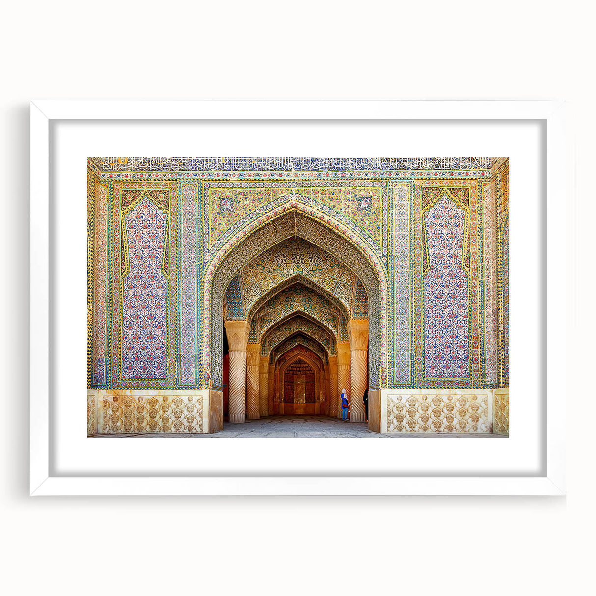 Abstract art print featuring a stylized Middle Eastern landscape in muted earth tones on a framed white mat.