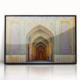 Large abstract wall art depicting a Middle Eastern scenery in muted earth tones on a black framed acrylic.