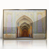 Framed acrylic print featuring a scenic depiction of Middle Eastern architecture in gold and earth tones.