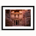 Extra large abstract art print of a colorful Jordanian landscape on textured canvas, framed in black.
