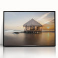 Large abstract wall art depicting the serene Bora Bora scenery in muted blue and green tones, framed in black acrylic.