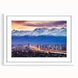 Abstract art print of Santiago skyline with vibrant hues on a framed white mat, ideal for dining room decor.