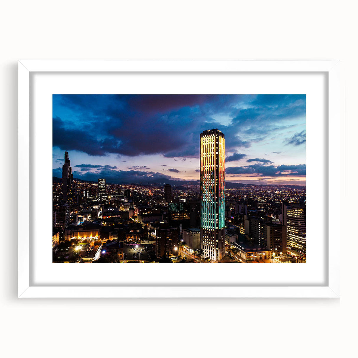 Abstract art print of a Colombian landscape in muted earth tones on a white-framed canvas, ideal for dining room decor.