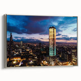 Landscape art painting of a Colombian scenery on a framed canvas, featuring vibrant colors against a black background.