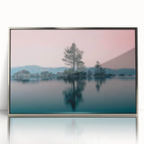 Mid-century modernist art depicting Lake Tahoe in muted blue and green tones, framed in silver acrylic.