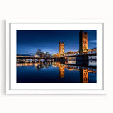 Abstract art print of Sacramento with vibrant hues on a white framed mat, ideal for dining room decor.
