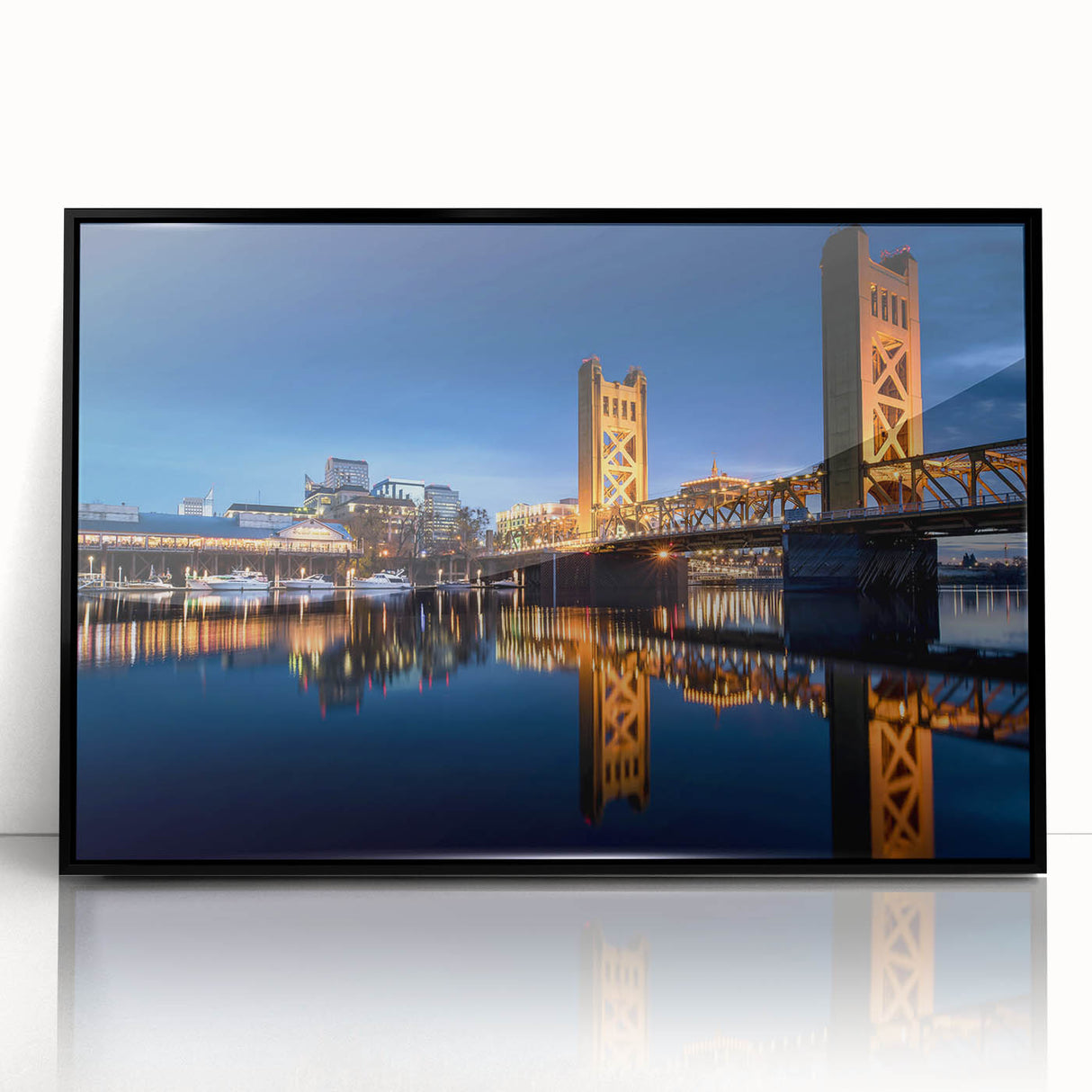 Large abstract wall art depicting the Sacramento skyline in muted gray and blue tones on a framed acrylic print.