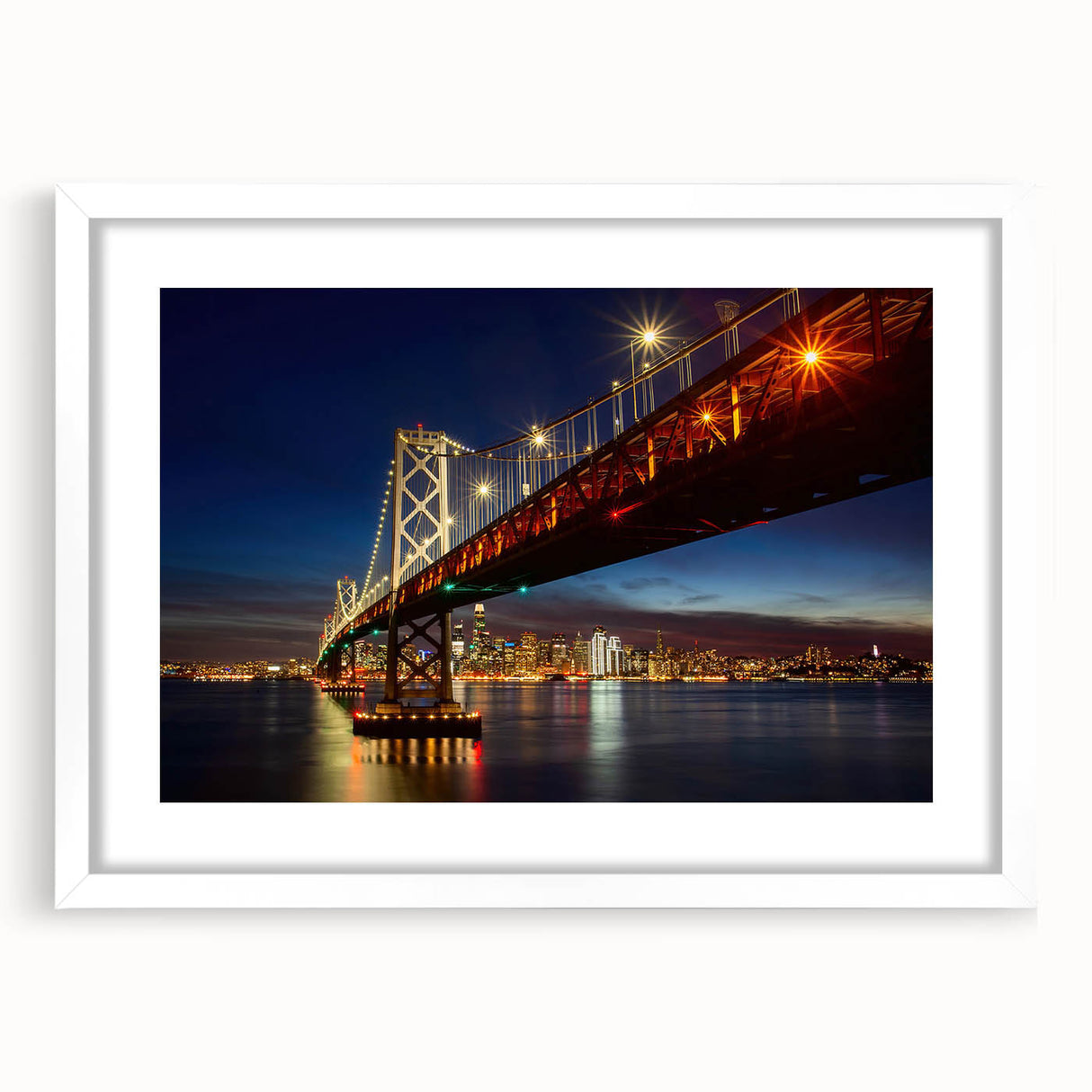 Abstract art print of San Francisco skyline in muted blue and gray tones, framed with a white mat.