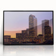 Large abstract wall art depicting Denver skyline in muted gray and blue tones, framed in black acrylic.