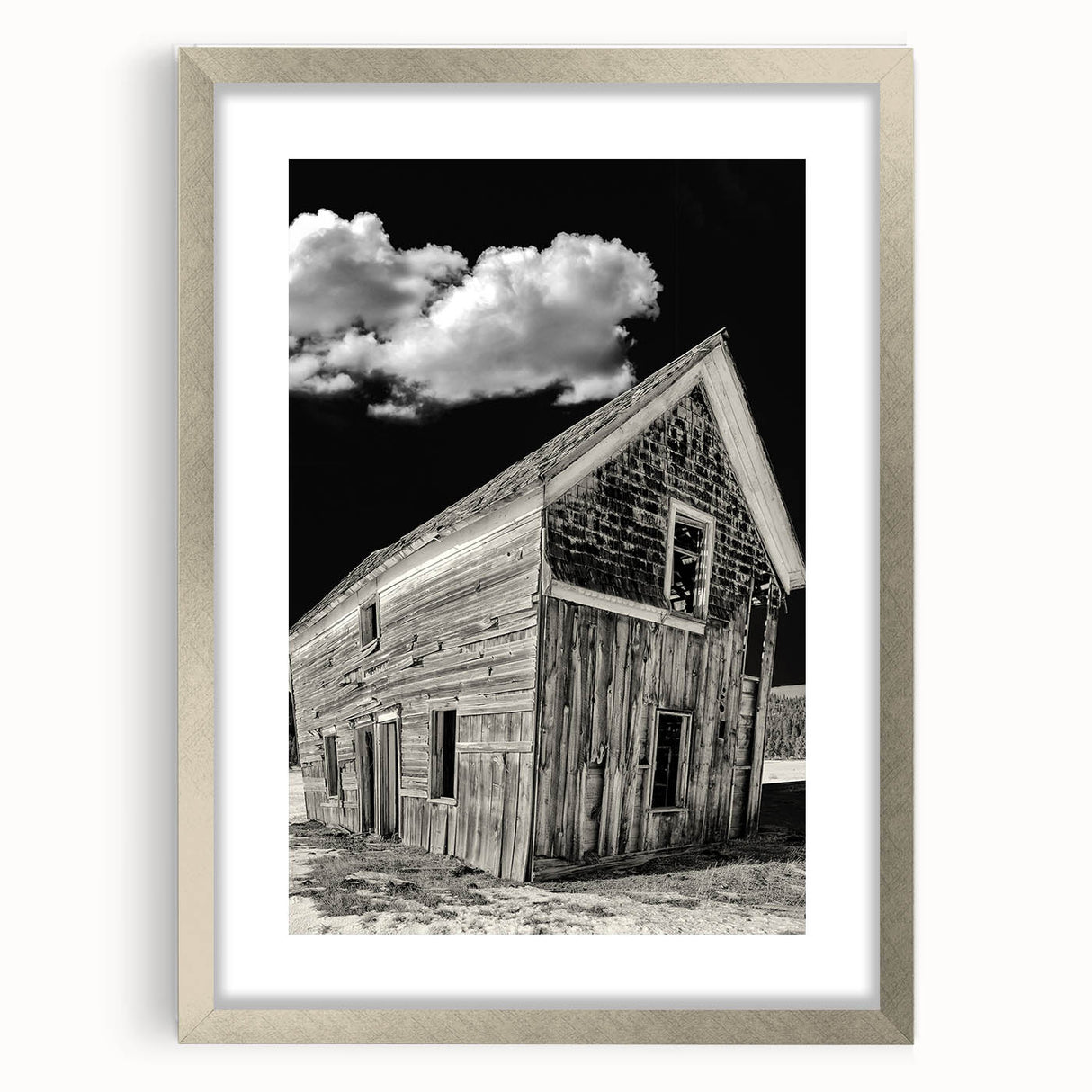 Textured abstract art print of Idaho scenery in muted earth tones, framed with a silver mat, suitable for bedroom decor.