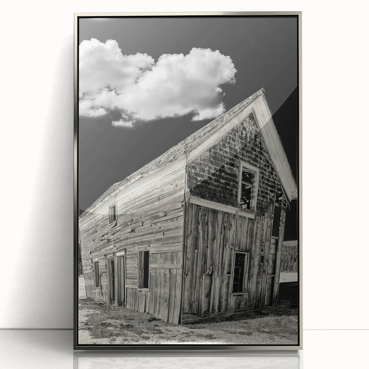 Mid-century modernist art depicting Idaho scenery in muted earth tones on a silver-framed acrylic print.