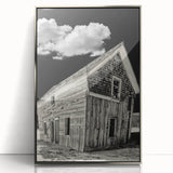 Mid-century modernist art depicting Idaho scenery in muted earth tones on a silver-framed acrylic print.