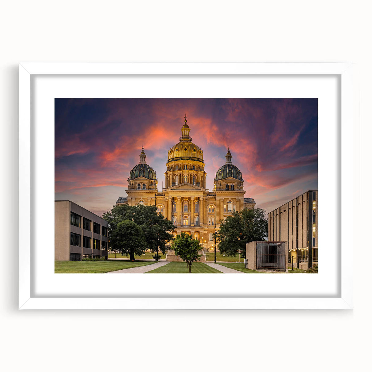 Abstract art print of Iowa scenery in muted green and blue tones, framed with a white mat, ideal for dining room decor.