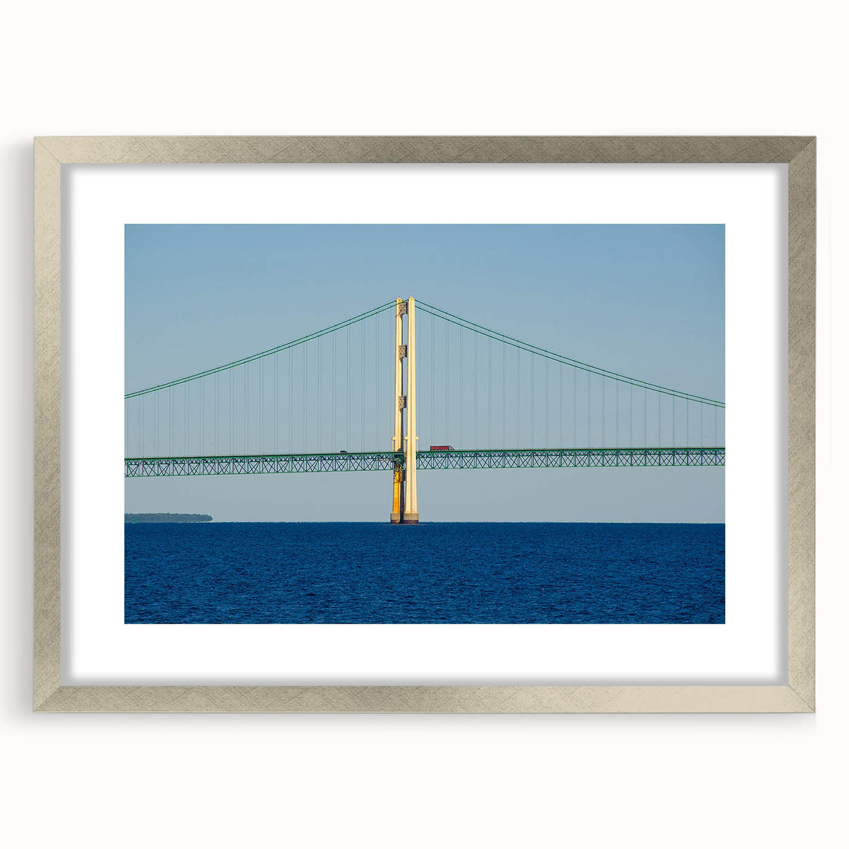 Textured art of abstract Michigan Upper Peninsula in muted earth tones on a silver-framed mat, ideal for bedroom art.