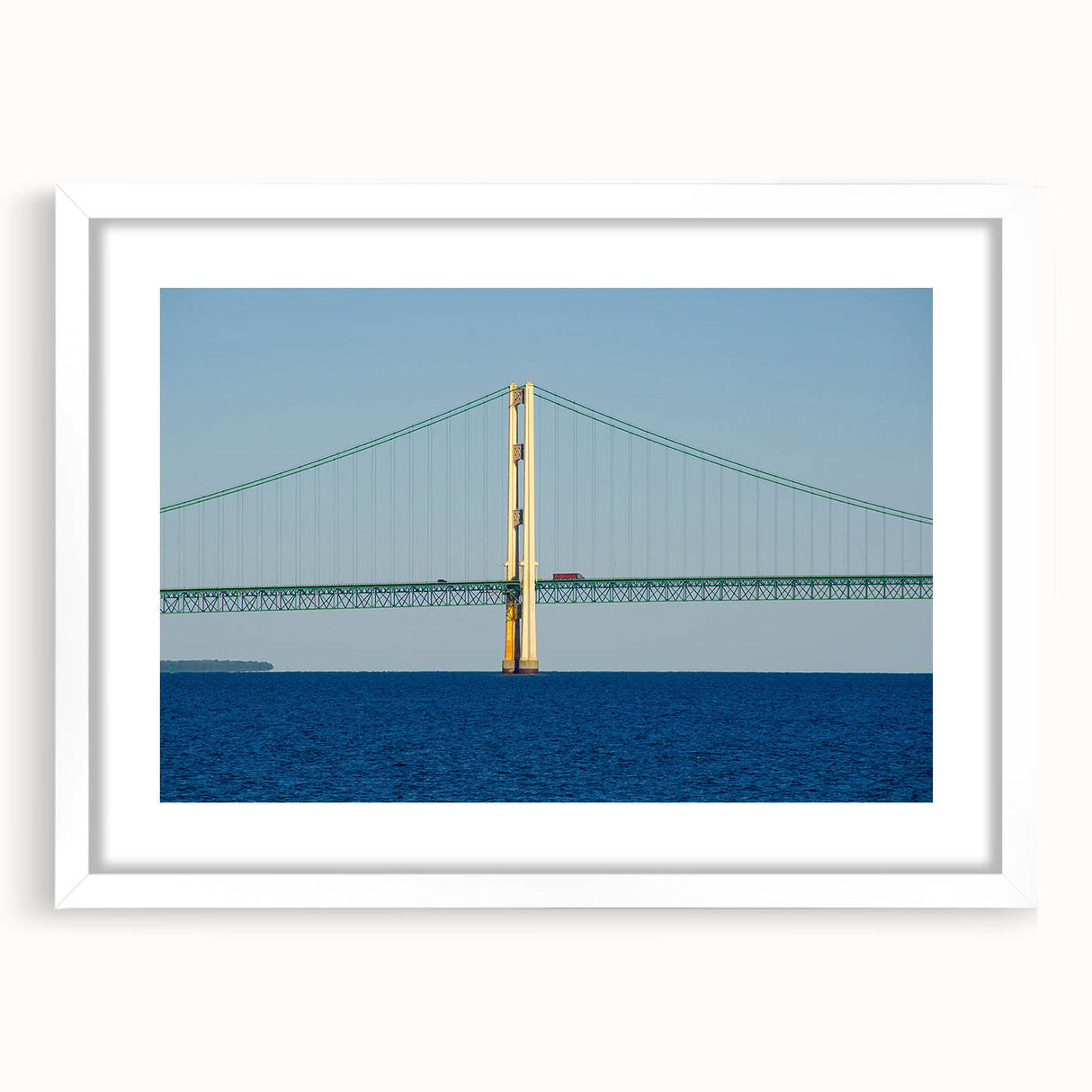 Abstract art print of Michigan's Upper Peninsula in muted green and blue tones on a white framed canvas.