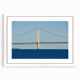 Abstract art print of Michigan's Upper Peninsula in muted green and blue tones on a white framed canvas.
