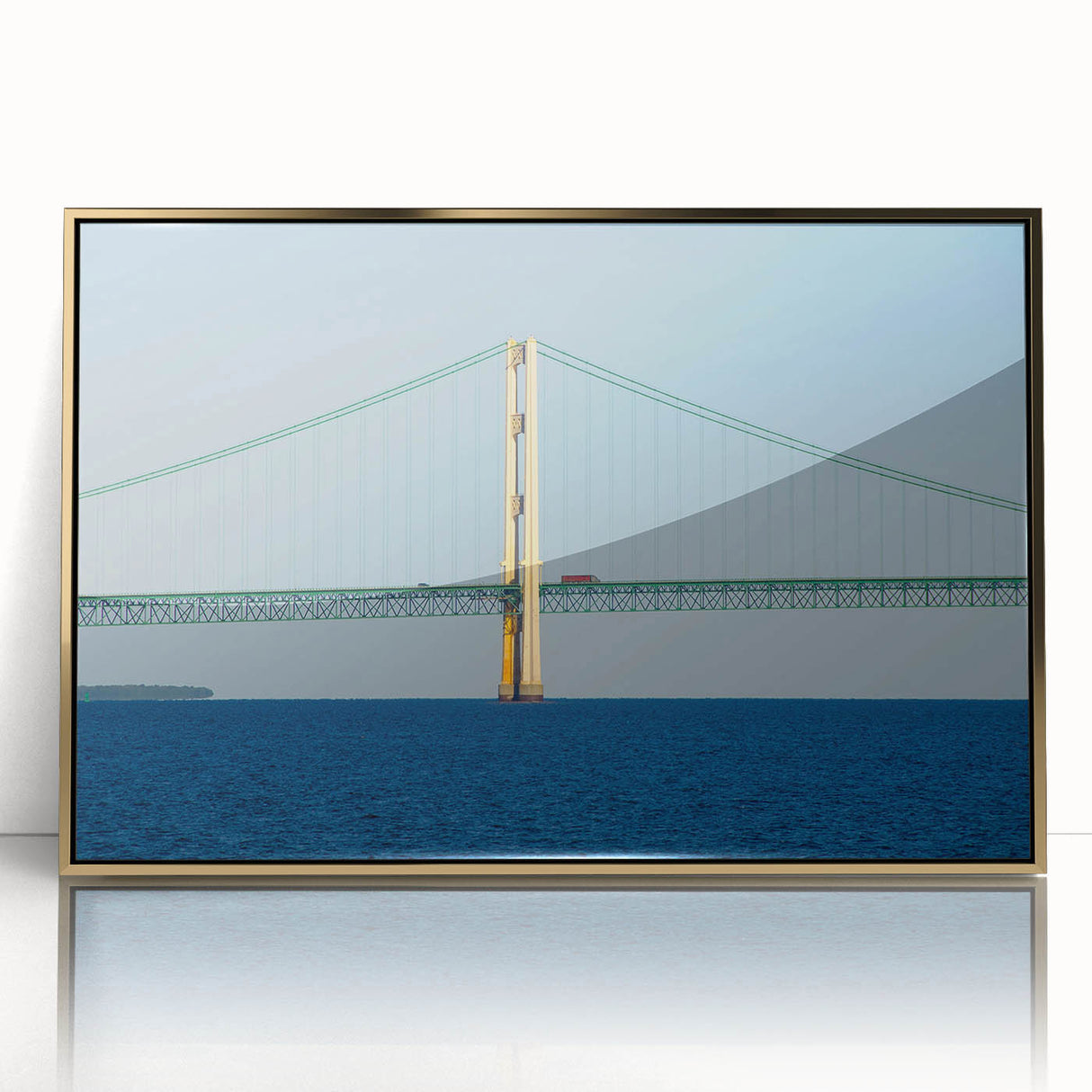 Mid-century modernist style acrylic print of Michigan's Upper Peninsula, in muted earth tones, framed in gold.