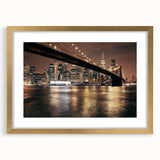 Extra large abstract art print of NYC's Brooklyn Bridge in muted gray, framed in gold, ideal for living room decor.