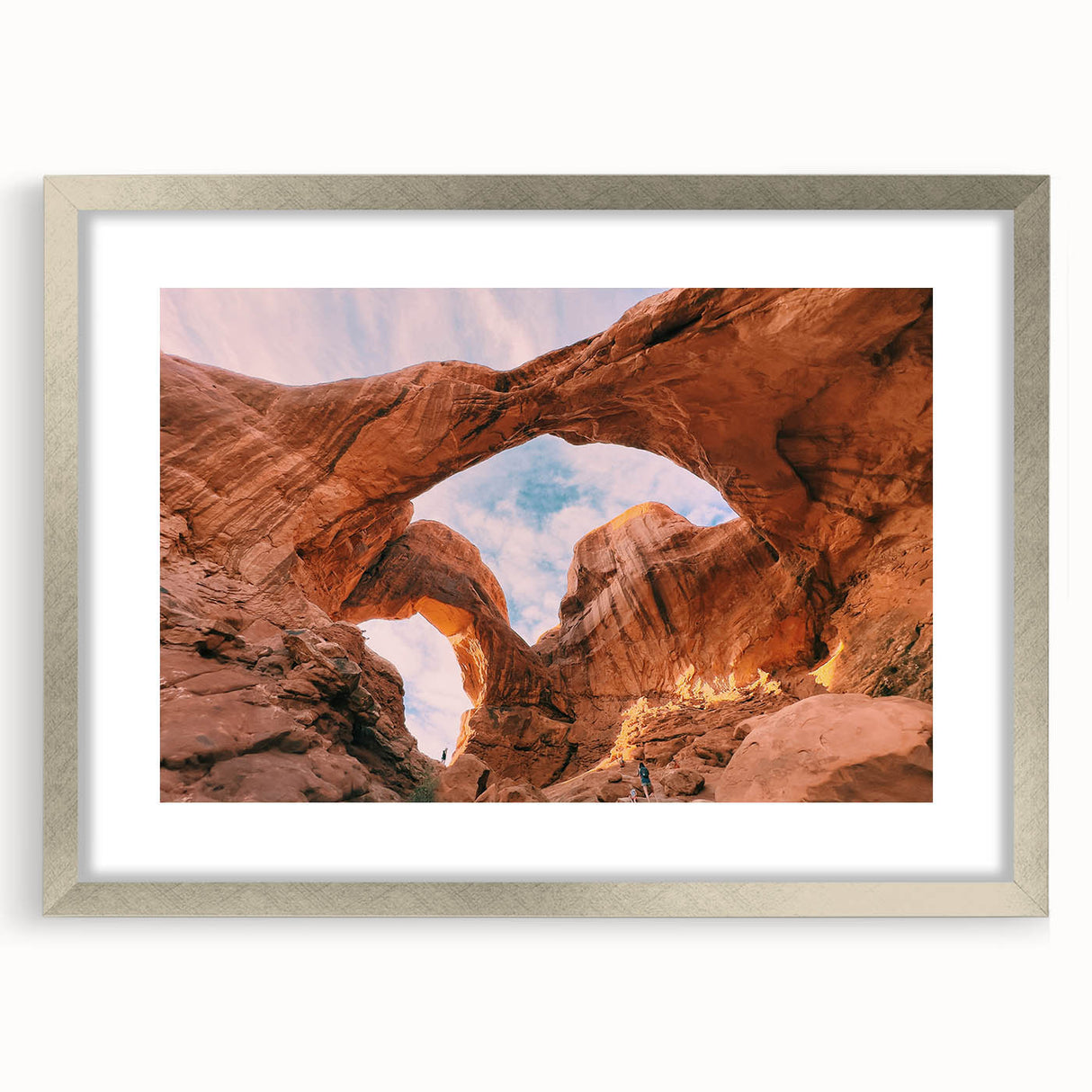 Textured art print of Arches National Park in Utah featuring earthy red and orange tones on a silver-framed mat.