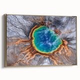 Framed canvas featuring a vintage-style landscape painting of Yellowstone, with muted earth tones.