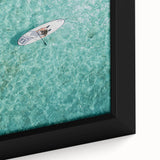 Close-up of a textured black wall art canvas with vibrant, colorful abstract designs, ideal for living room decor.