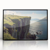 Framed acrylic artwork depicting dramatic cliffs with rich textures and vibrant colors, set against a sleek black frame, ideal for modern interior decor.