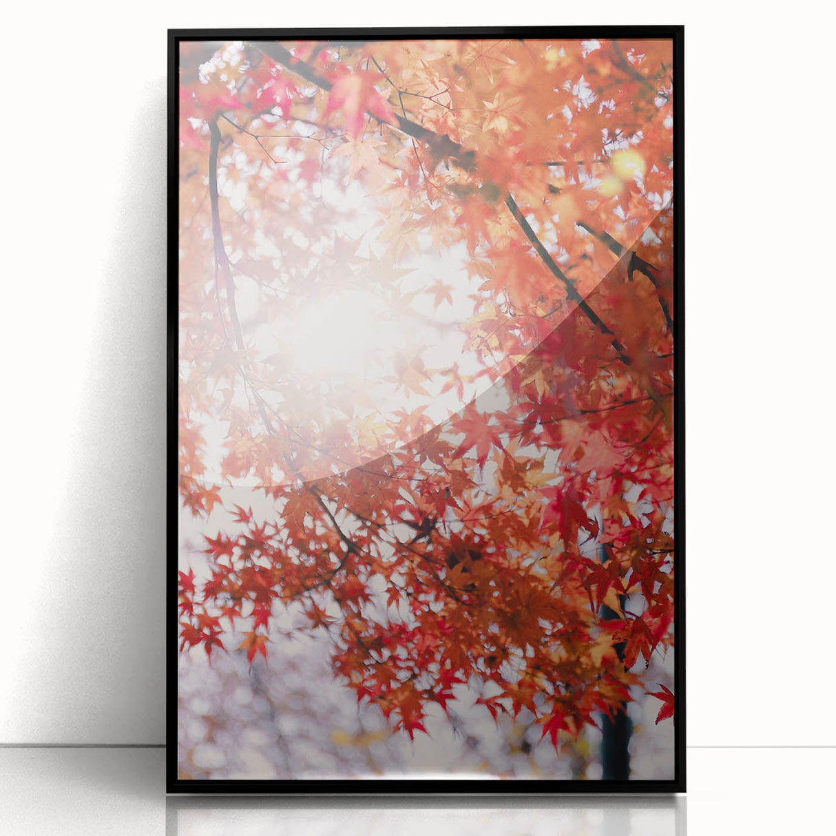 Large abstract wall art featuring fall-themed colors in orange and brown hues, framed in black acrylic.