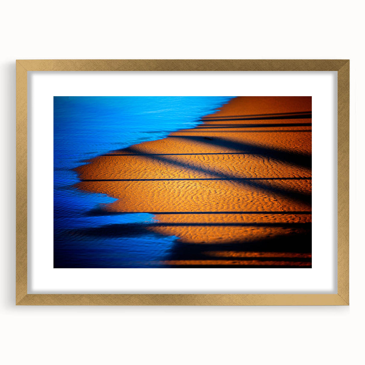 Abstract landscape wall art framed with a gold mat, showcasing vibrant colors and intricate patterns, ideal for modern home decor or office settings.