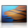 Framed abstract landscape wall art with a black frame, showcasing vibrant colors and fluid shapes, perfect for modern home decor or office settings.