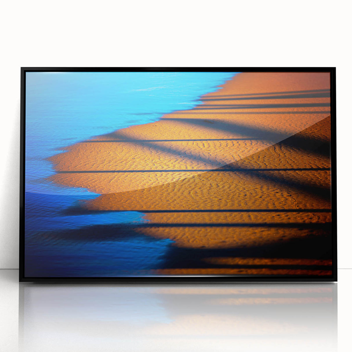 Framed abstract landscape wall art with a black frame, showcasing vibrant colors and fluid shapes, perfect for modern home decor or office settings.