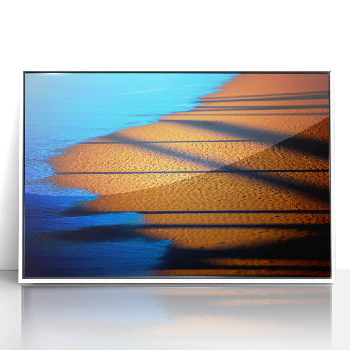 Framed abstract landscape wall art featuring vibrant colors and fluid shapes, set in a sleek white frame, ideal for modern home decor. This acrylic piece adds a contemporary touch to any room.