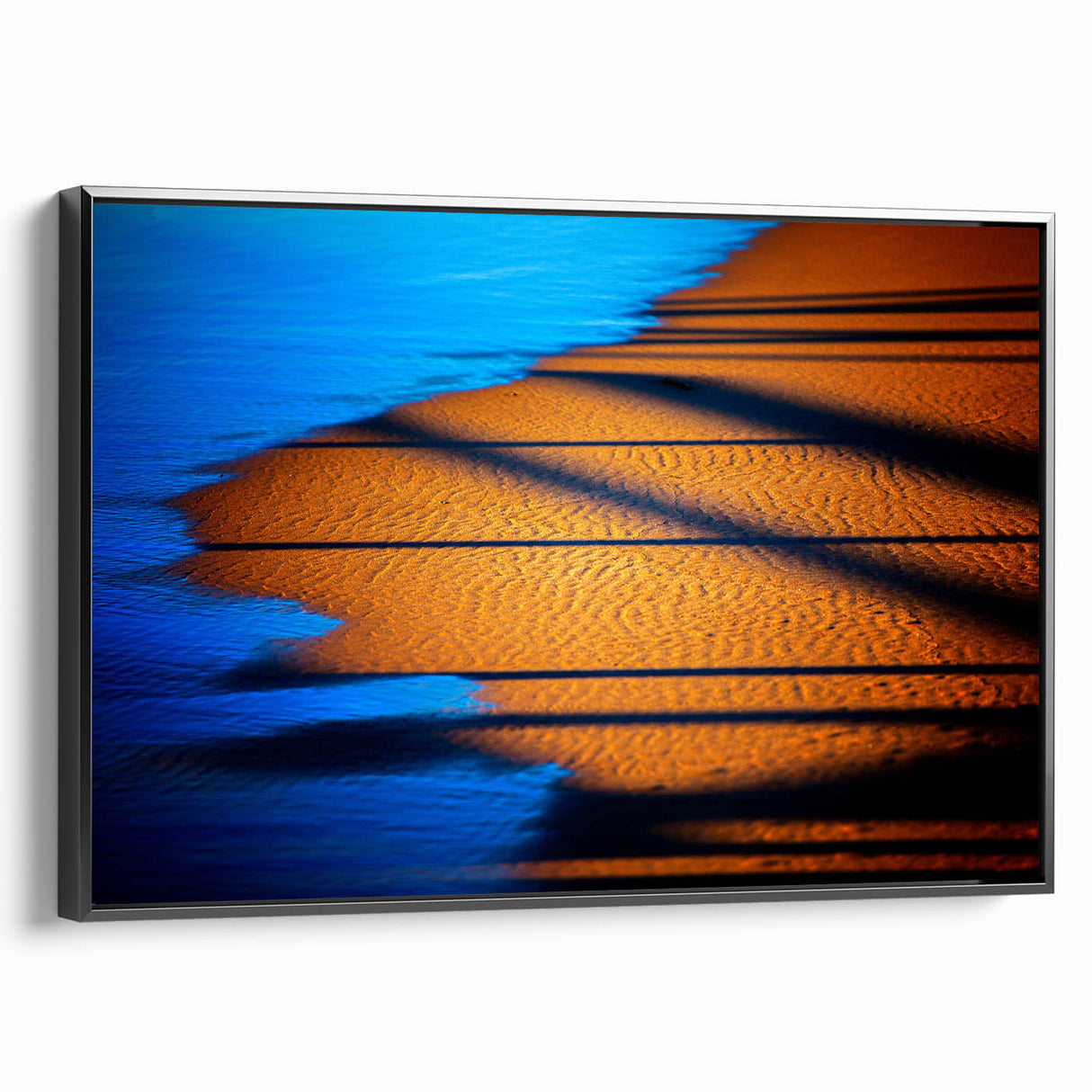 Framed abstract landscape wall art featuring rich earth tones and textured brushstrokes, displayed in a sleek black frame, ideal for modern home decor.