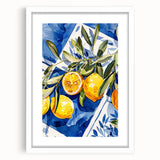 Abstract art print featuring assorted fruits in vivid colors, framed with a white mat, suitable for dining room decor.