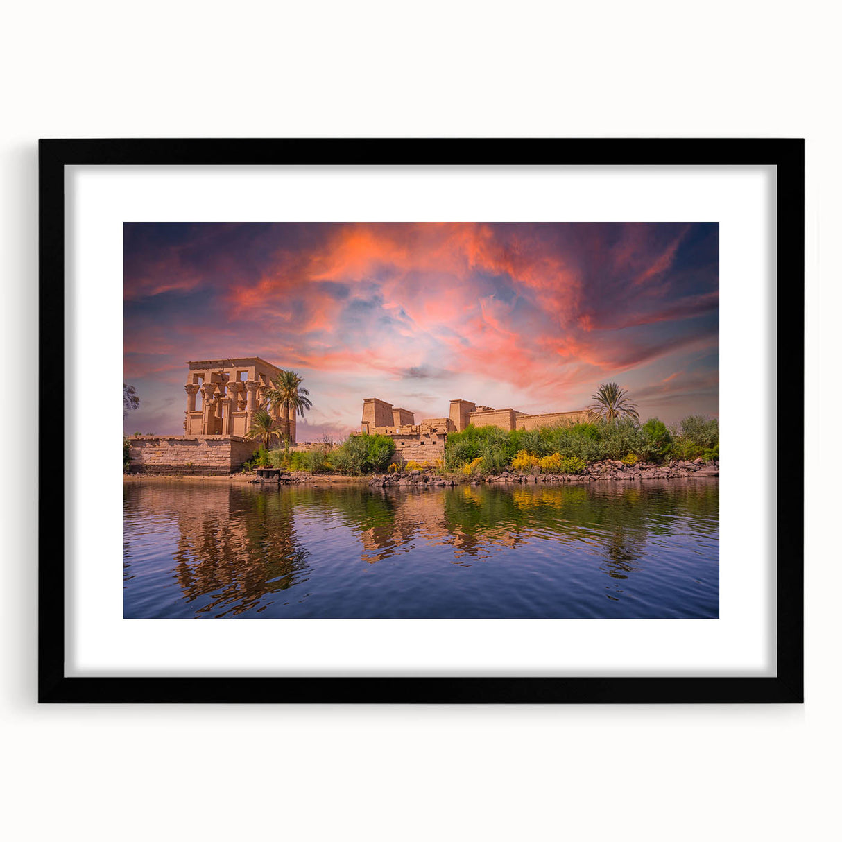 Abstract art print featuring textured, colorful depiction of Egyptian scenery on a large black-framed canvas.