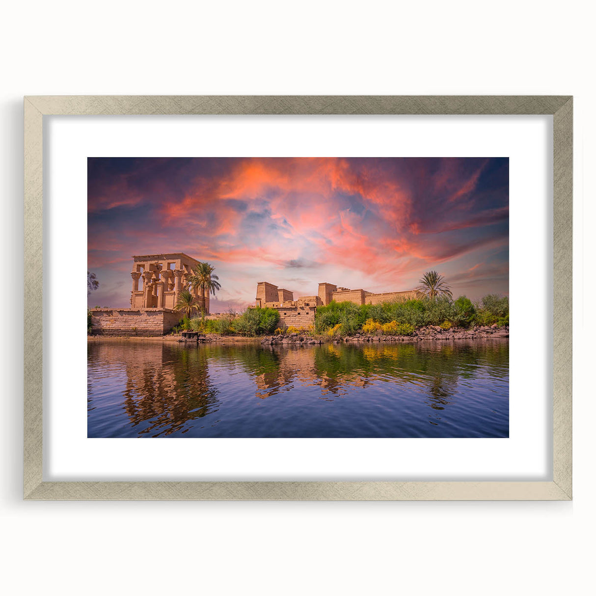 Abstract art print of an Egyptian landscape in muted earth tones on a framed silver mat, suitable for dining room decor.