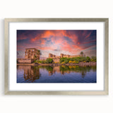 Abstract art print of an Egyptian landscape in muted earth tones on a framed silver mat, suitable for dining room decor.