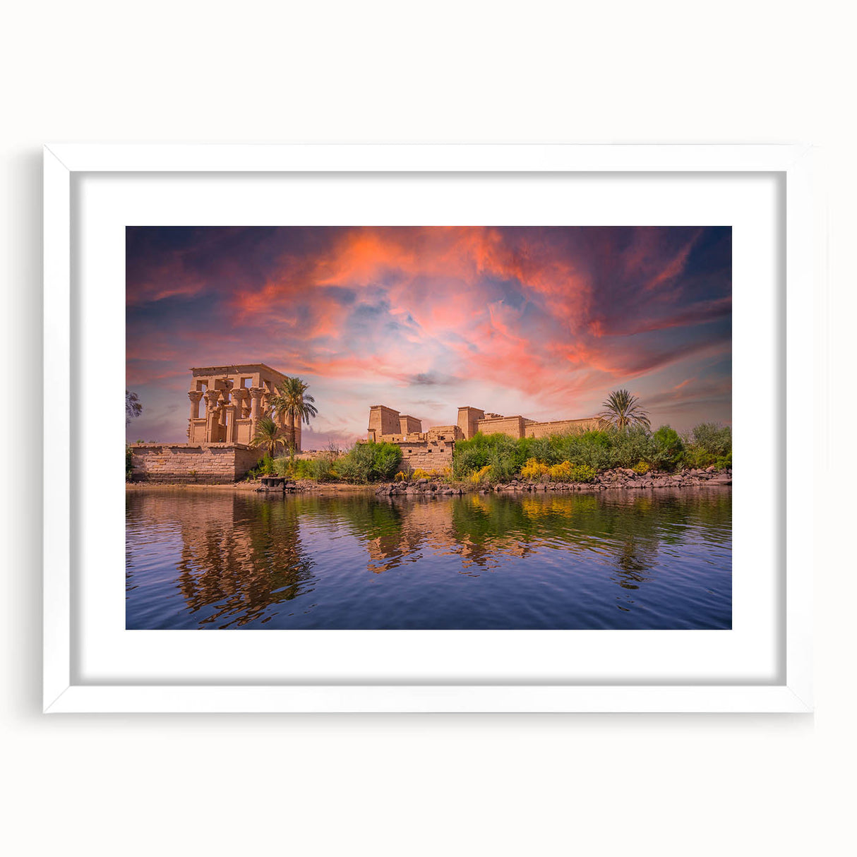 Abstract art print of an Egyptian landscape in textured hues of orange and brown on a large framed canvas.