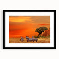 Extra large abstract art print depicting a colorful, textured African landscape on a framed black mat.
