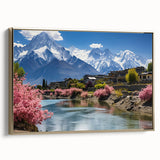 Framed canvas featuring a vintage-style landscape painting of a serene Pakistani scenery in muted gold and black tones.