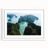 Abstract art print of a Vietnamese landscape in muted green and blue tones on a framed white mat.