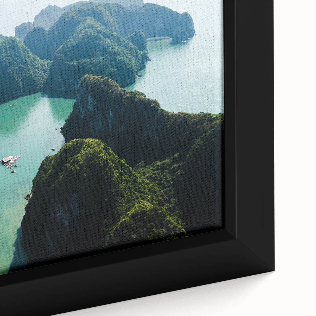 Framed canvas featuring a textured, colorful Vietnamese landscape in black with vibrant accents, ideal for living room decor.
