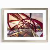 Textured abstract art print of Alberta scenery in muted earth tones, framed with a silver mat, suitable for bedroom decor.
