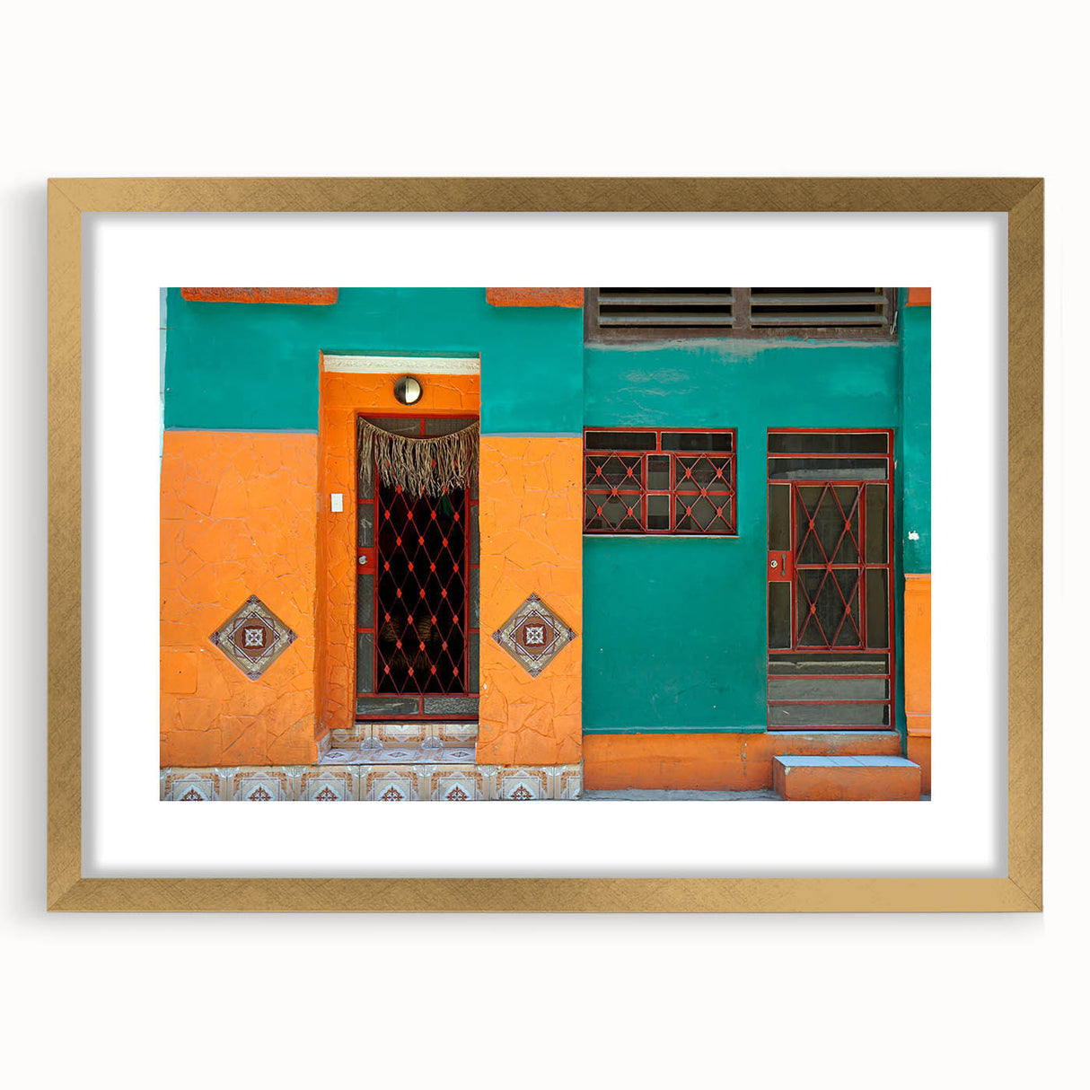 Abstract art print of a Caribbean scene, featuring muted blue and green tones on a framed gold mat.