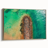 Framed canvas featuring a vintage-style landscape painting of a Caribbean scenery in muted gold and black tones.