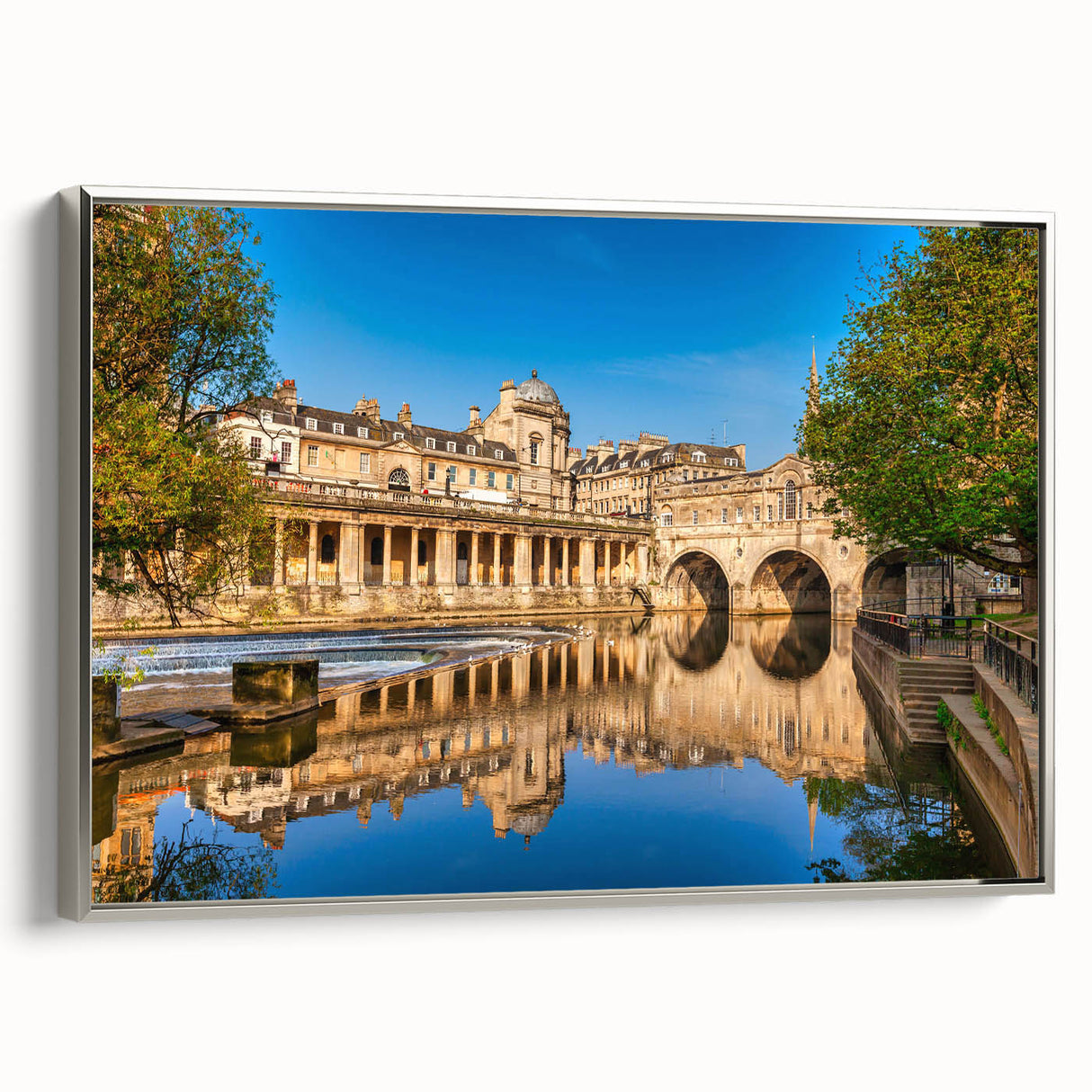Framed canvas of a vintage-style landscape painting depicting Bath, England, in vibrant colorful hues.