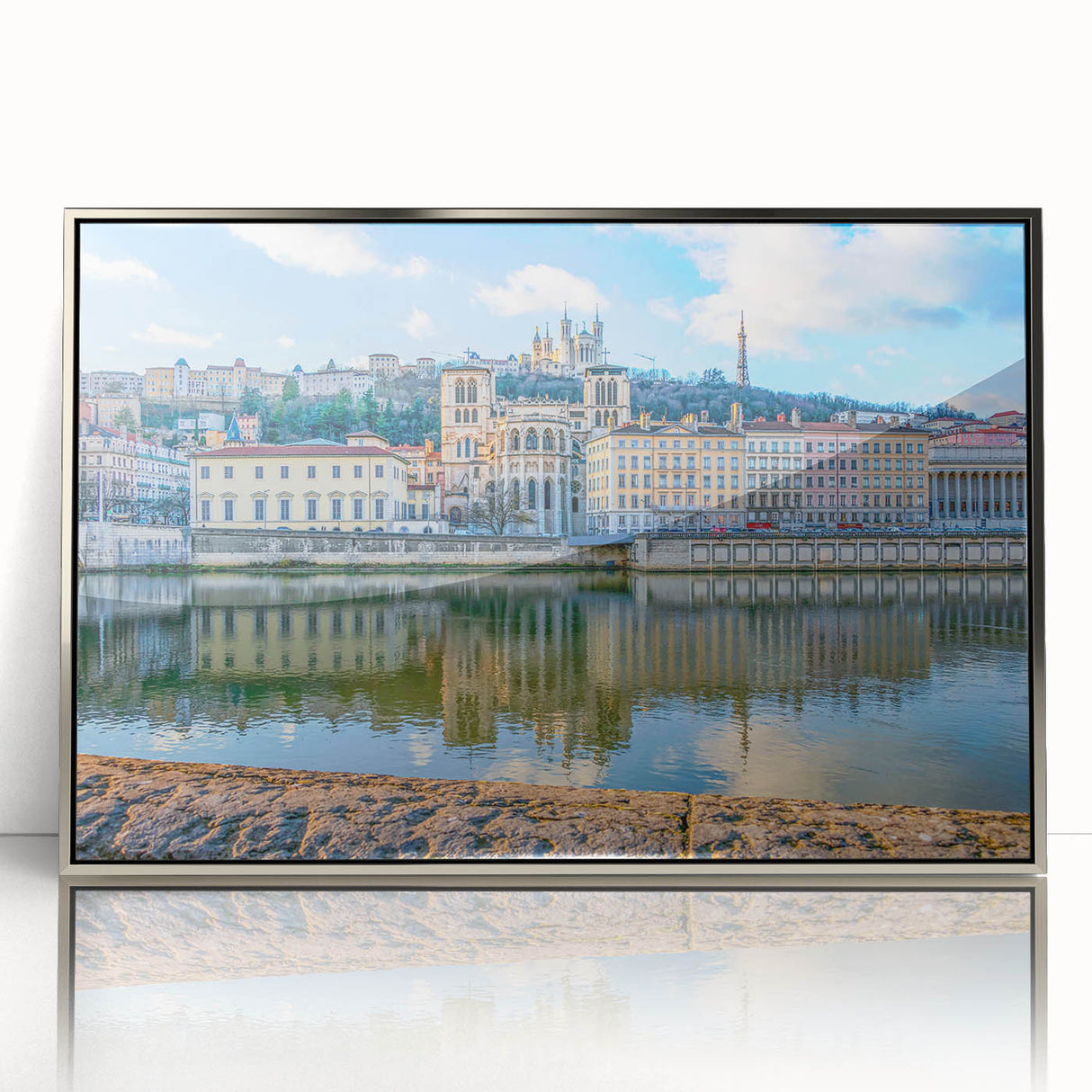 Large art print of Lyon, France, in mid-century modernist style on silver-framed acrylic, with muted color tones.
