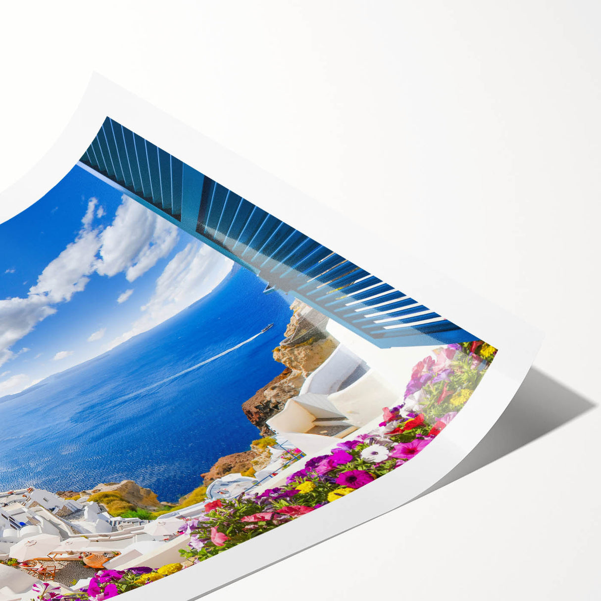 Extra large wall art of Santorini, Greece in vibrant blues and whites on a rolled print.