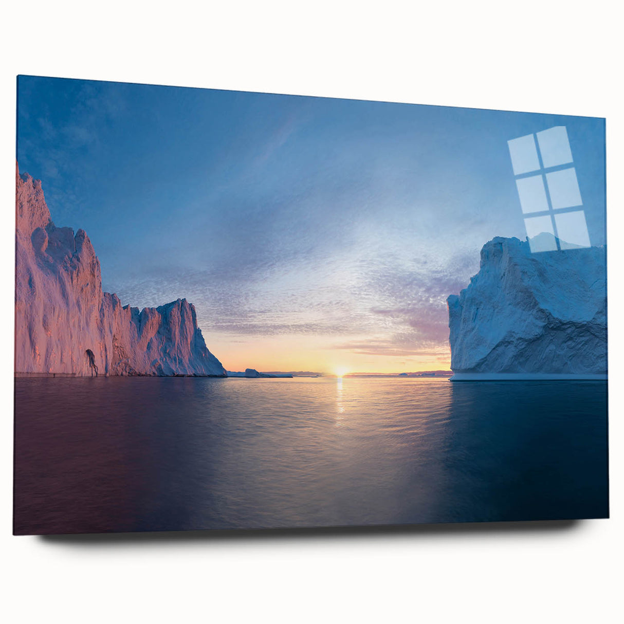 Large abstract wall art of a Greenland scenery in muted green and blue tones on acrylic glass.