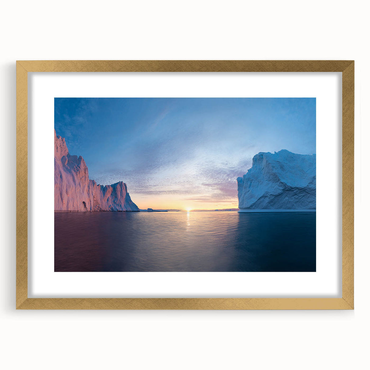 Abstract art print of a Greenland landscape in muted green and blue tones, framed with a gold mat.