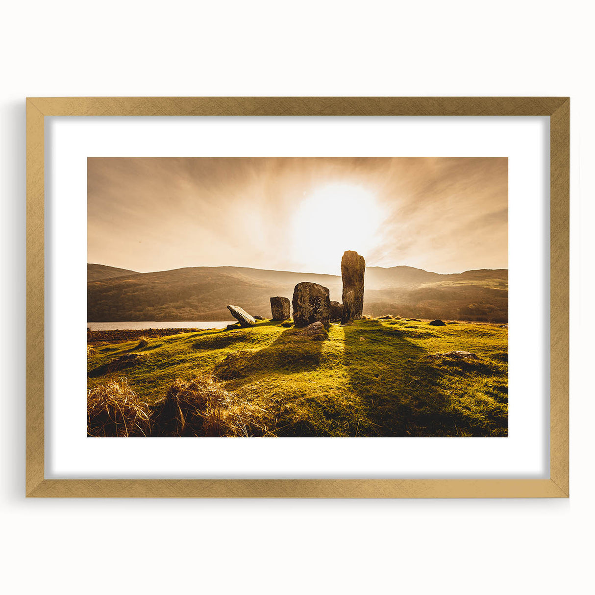 Abstract art print of a muted green and blue Irish landscape, framed in gold, suitable for dining room decor.